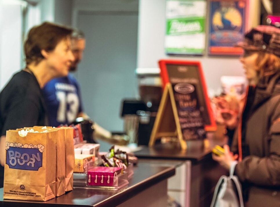 indoors, movie theatre, customer, popcorn, cafe, ordering, cinema, customer, customer, customer, customer, customer, popcorn, popcorn, ordering