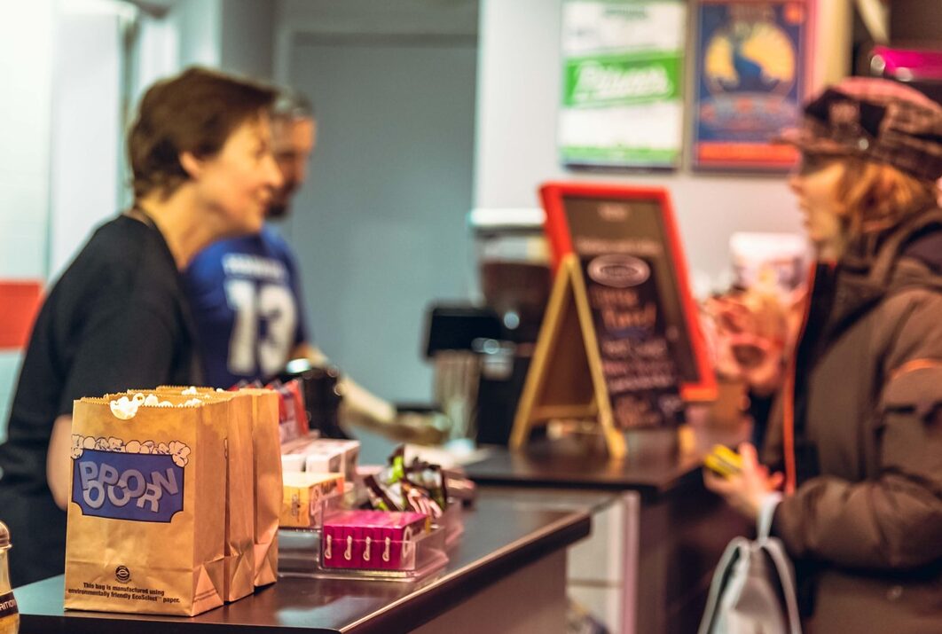 indoors, movie theatre, customer, popcorn, cafe, ordering, cinema, customer, customer, customer, customer, customer, popcorn, popcorn, ordering